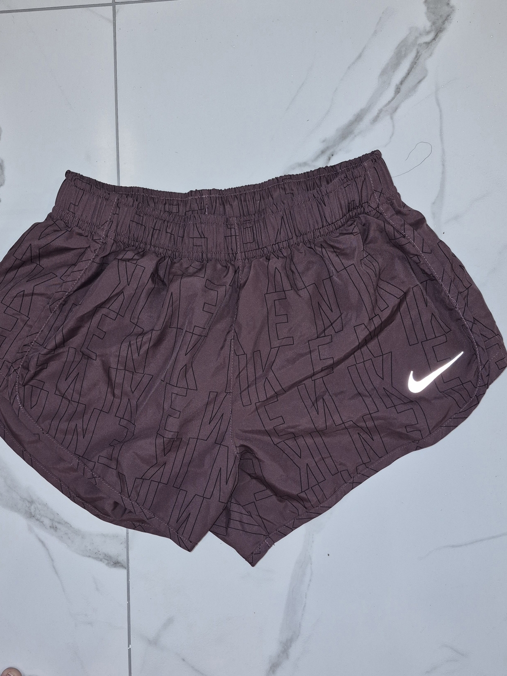 Nike Women's Burgundy Athletic Shorts with Reflective Swoosh